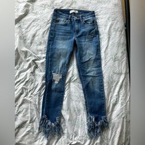 Distressed skinny jeans